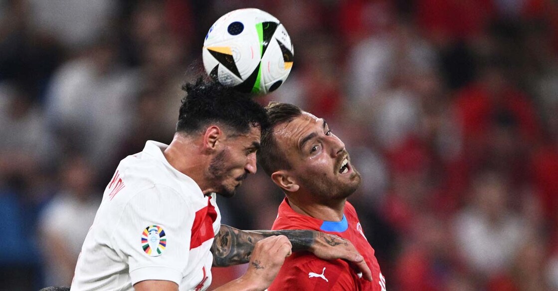 Soccer Football - Euro 2024 - Group F - Czech Republic v Turkey - Hamburg Volksparkstadion, Hamburg, Germany - June 26, 2024 Turkey's Samet Akaydin in action with Czech Republic's Tomas Chory REUTERS/Annegret Hilse