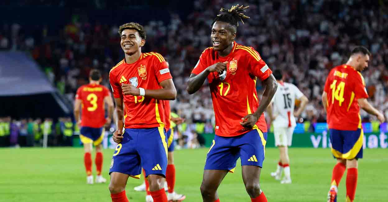 SOCCER-EURO-ESP-GEO-REPORT Spain's Nico Williams celebrates scoring their third goal with Lamine Yamal Photo: REUTERS/Wolfgang Rattay