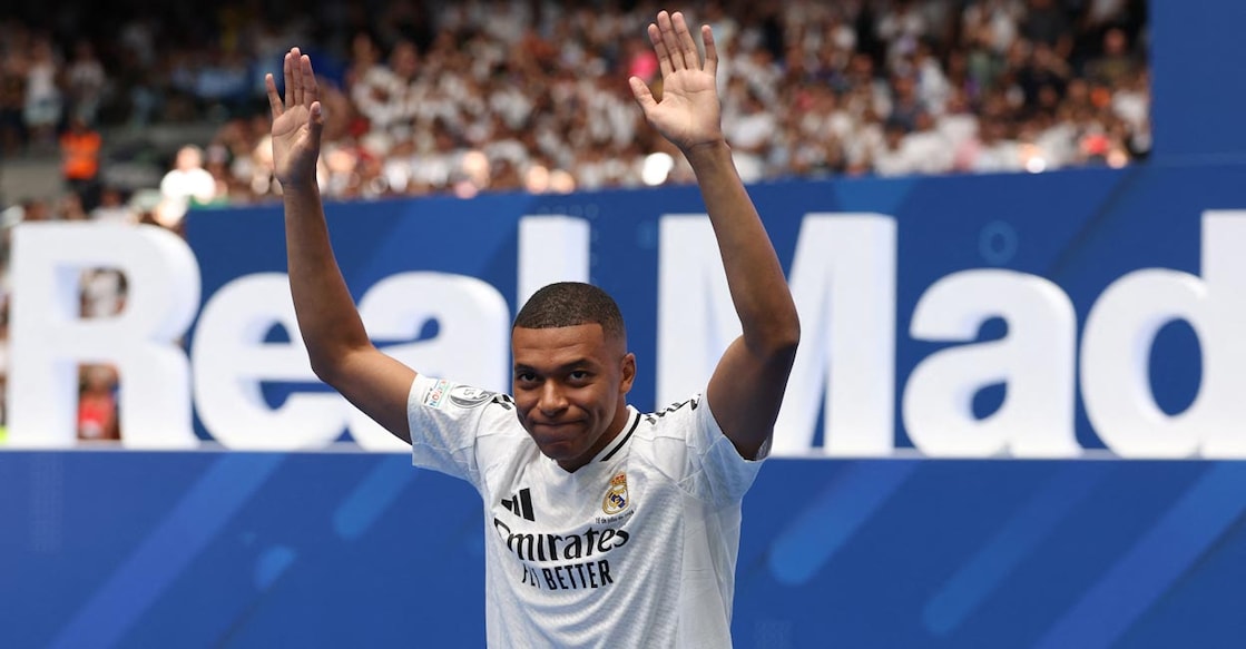Kylian Mbappe waves to the fans during his unveiling at the Santiago Bernabeu Stadium in Madrid. Photo: AFP/Pierre-Philippe Marcou