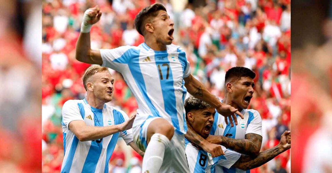 Cristian Medina of Argentina celebrates scoring their second goal against Morocco. Photo: Reuters/Thaier Al-Sudani
