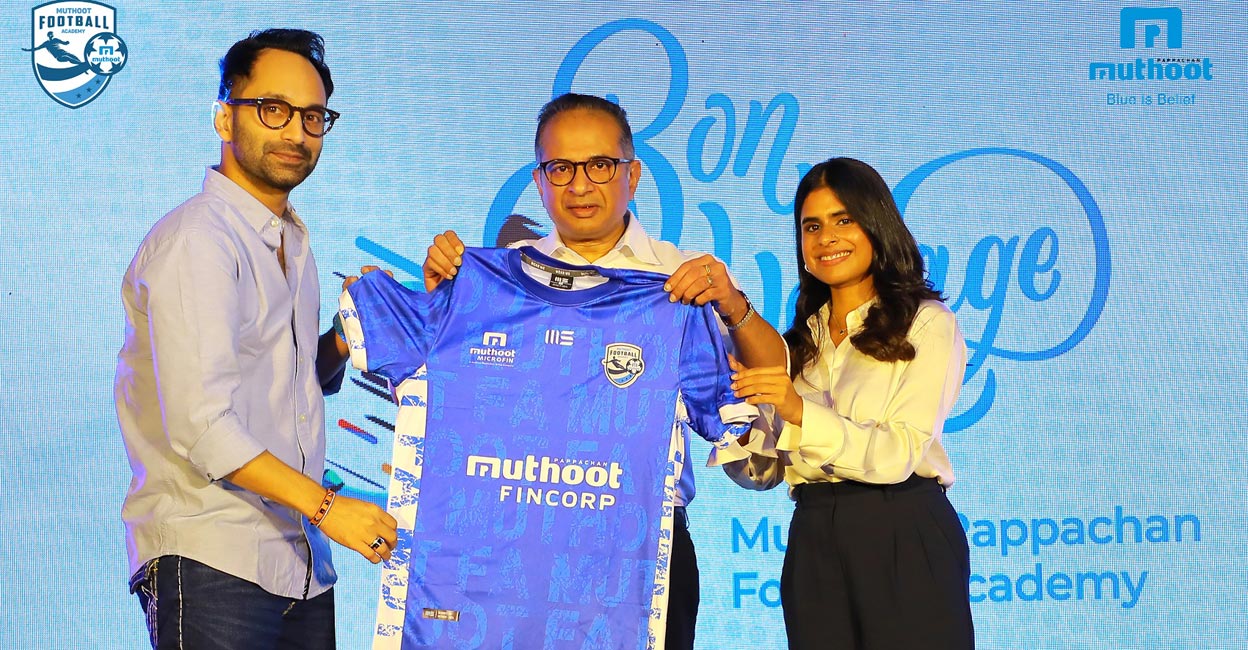 Fahadh Faasil unveils jersey Fahadh Faasil unveils the jersey in the presence of directors of Muthoot Pappachan Group Thomas Muthoot and Hannah Muthoot. Photo: Special arrangement