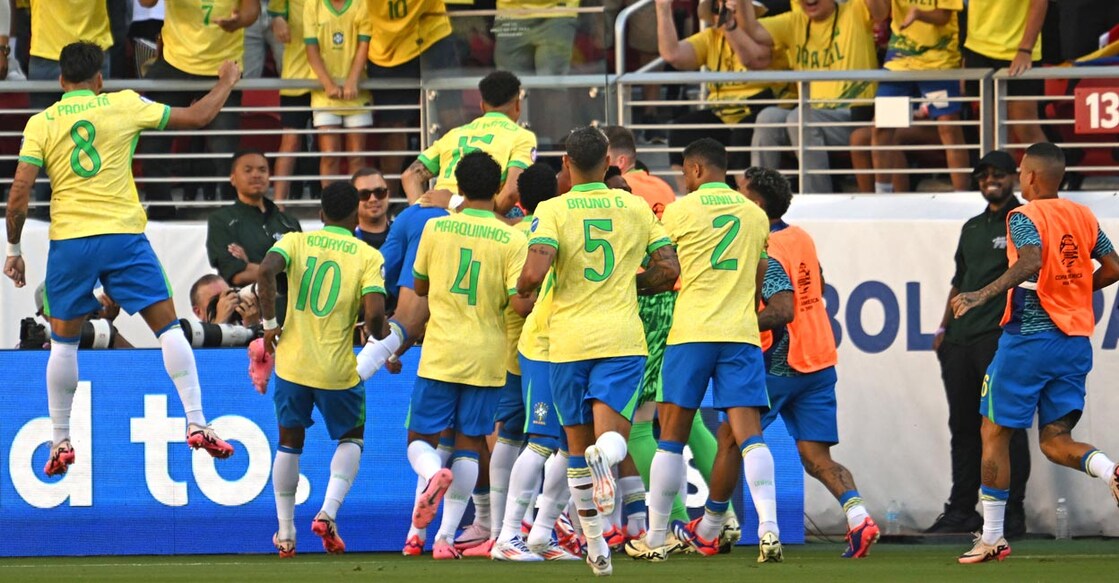 Brazil players celebrate a goal against Colombia. Photo: AFP/Patrick T Fallon