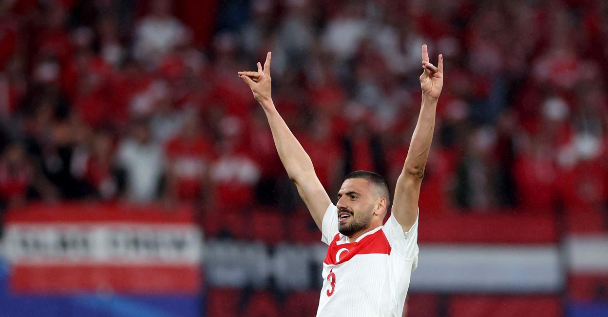 Merih Demiral makes a controversial gesture as he celebrates his second goal. Photo: AFP/Ronny Hartmann