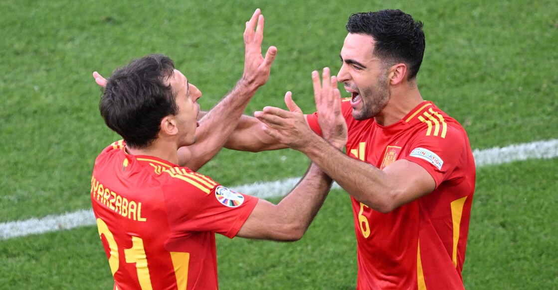 Spain's Mikel Merino (right) celebrates with teammate Mikel Oyarzabal after scoring his team's winner during the UEFA Euro 2024 quarterfinal at the Stuttgart Arena in Stuttgart on July 5, 2024. Photo: AFP/ Kirill Kudryavtsev 