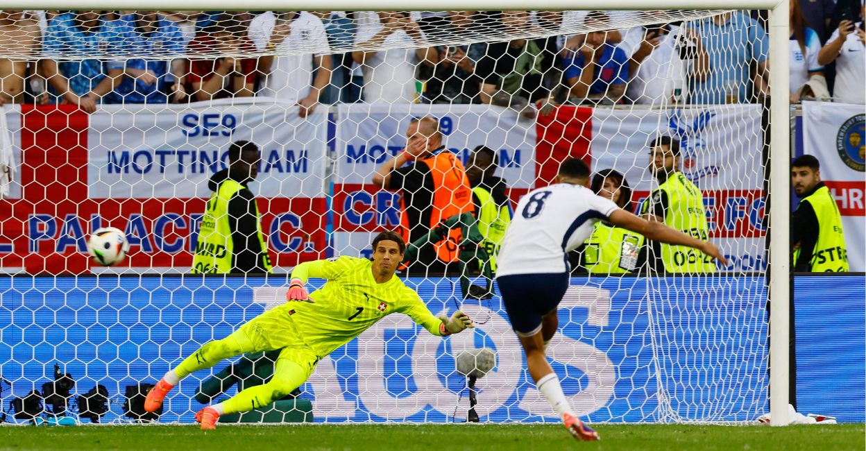 England's Trent Alexander-Arnold scores a penalty during the penalty shootout. Photo: Reuters/Wolfgang Rattay