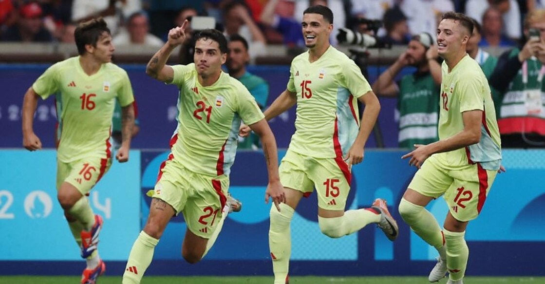 Sergio Camello, second left, celebrates with teammates after scoring their fourth goal. Phot: Reuters/Paul Childs