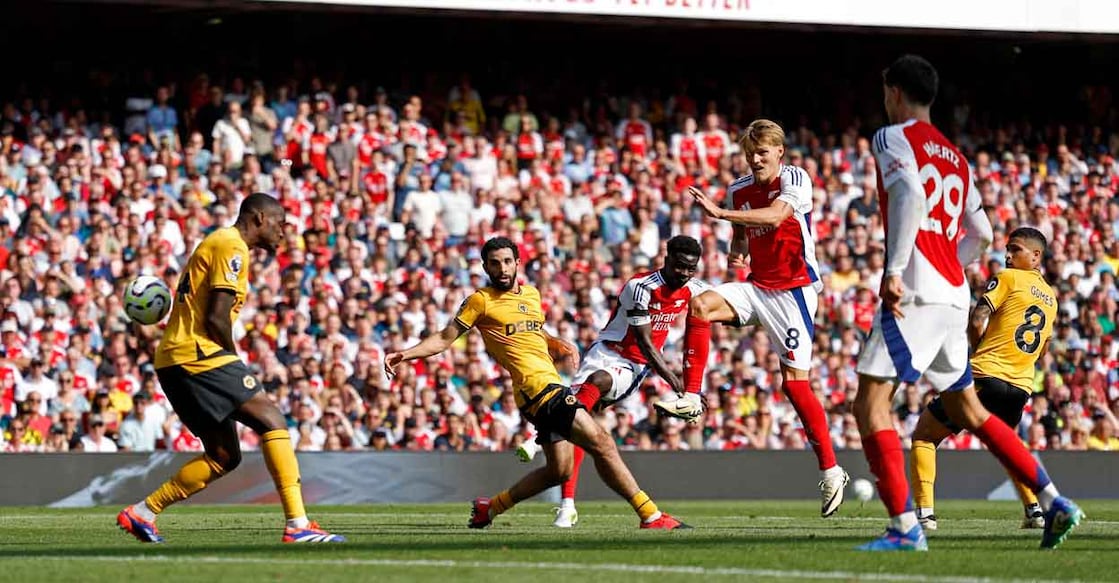 Arsenal's Bukayo Saka scores their second goal against Wolves. Photo: Reuters/John Sibley