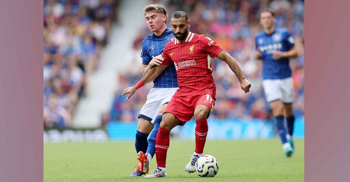 Liverpool's Mohamed Salah in action with Ipswich Town's Leif Davis. Photo: Reuters/David Klein