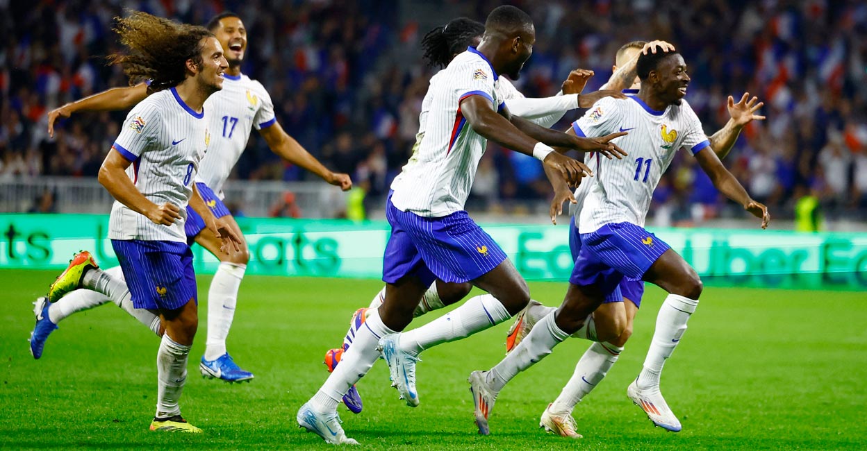France's Ousmane Dembele, right, celebrates with teammates after scoring their second goal. Photo: Reuters/Sarah Meyssonnier