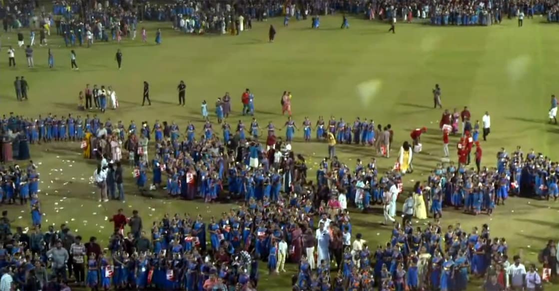 Dancers and other occupy the field of pay (FOP) in the Jawaharlal Nehru Stadium at Kaloor in Kochi on December 29 during a mega Bharatanatyam performance. Photo: Screengrab/YouTube/MridangaVisiion 