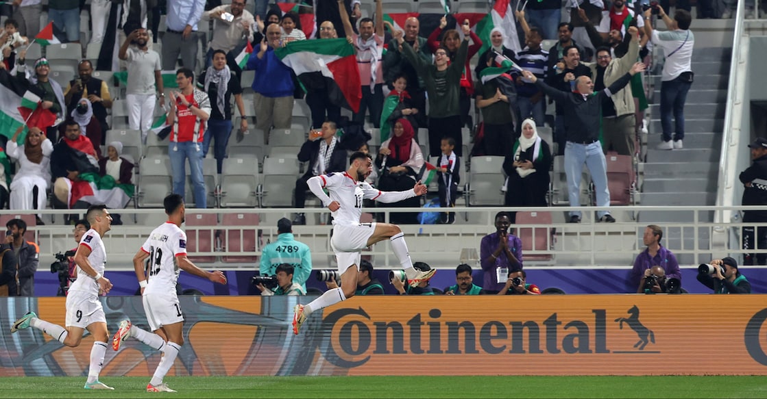 Palestine's forward Oday Dabbagh celebrates after scoring his team's first goal during the Qatar 2023 AFC Asian Cup Group C football match against Hong Kong at the Abdullah bin Khalifa Stadium in Doha on January 23, 2024. Photo: AFP/ Giuseppe Cacace