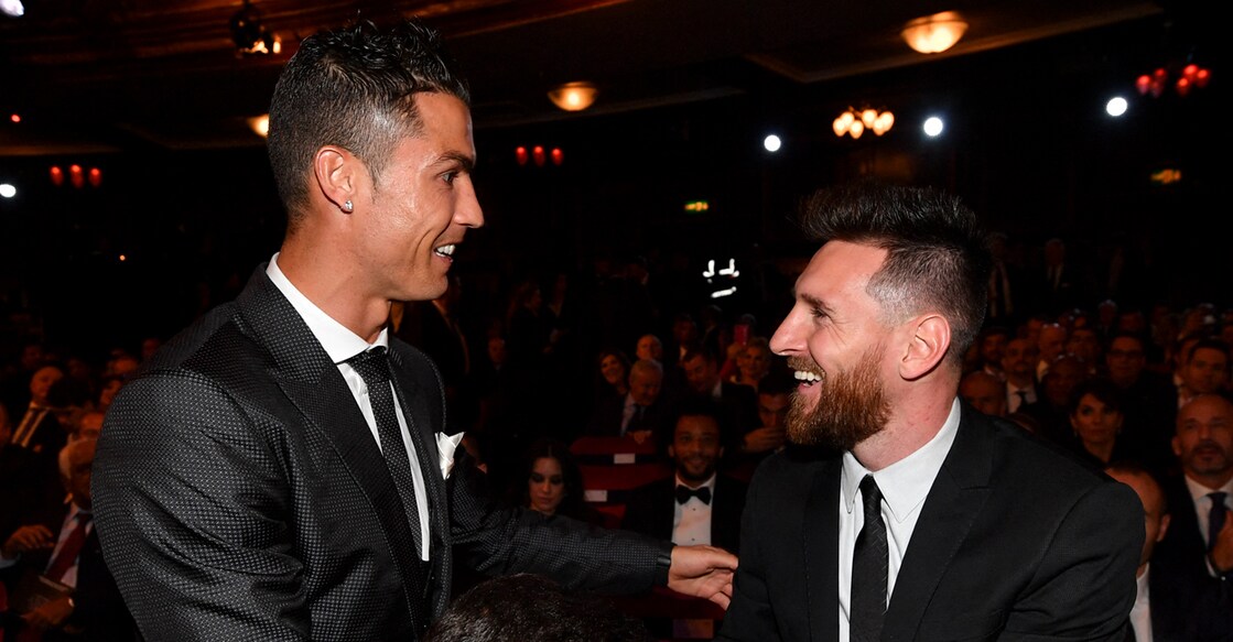 A file photo of Cristiano Ronaldo and Lionel Messi during 'The Best' football awards on October 23, 2017 in London. File photo: AFP/ Ben Stansall 