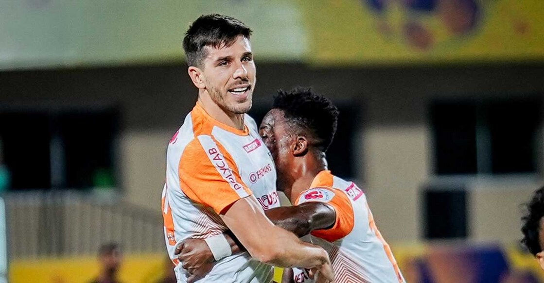 Blasters players Kwame Peprah and Dusan Lagator celebrating scoring a goal during the ISL match against Hyderabad. Photo: X\@KeralaBlasters