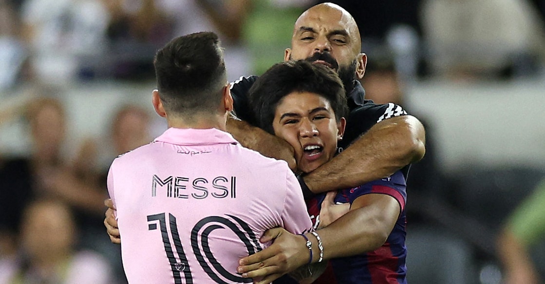 Yassine Chueko, bodyguard of Lionel Messi, pulls a fan, who ran onto the pitch, away from the Argentine superstar during an Inter Miami match in Los Angeles, California in September 2023. File photo: AFP/Harry How/Getty Images
