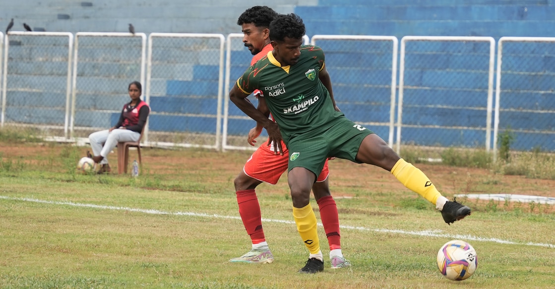wayanad-united-kseb-kpl Wayanad United's Sibi Abraham vies for the ball with KSEB's Nijo Gilbert during a Kerala Premier League match at Manjeri on April 25, 2025. Photo: Special arrangement