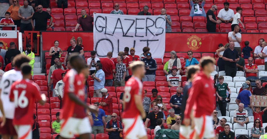 Manchester United fans display a protest banner in the stands after the Premier League match against West Ham United at Old Trafford on May 11, 2025. Photo: Reuters/Chris Radburn