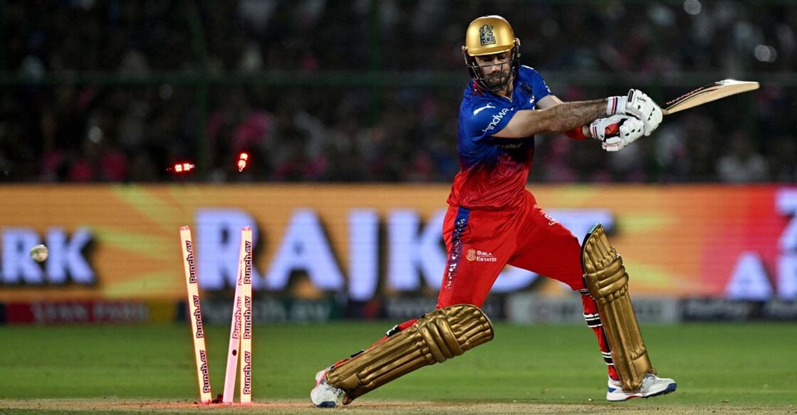 Royal Challengers Bengaluru's Glenn Maxwell is is clean bowled during the Indian Premier League (IPL) Twenty20 cricket match between Rajasthan Royals and Royal Challengers Bengaluru at the Sawai Mansingh Stadium in Jaipur on April 6, 2024. (Photo by Arun SANKAR / AFP) / -- IMAGE RESTRICTED TO EDITORIAL USE - STRICTLY NO COMMERCIAL USE -- - -- IMAGE RESTRICTED TO EDITORIAL USE - STRICTLY NO COMMERCIAL USE --
