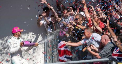 Hamilton wins US GP but made to wait for title