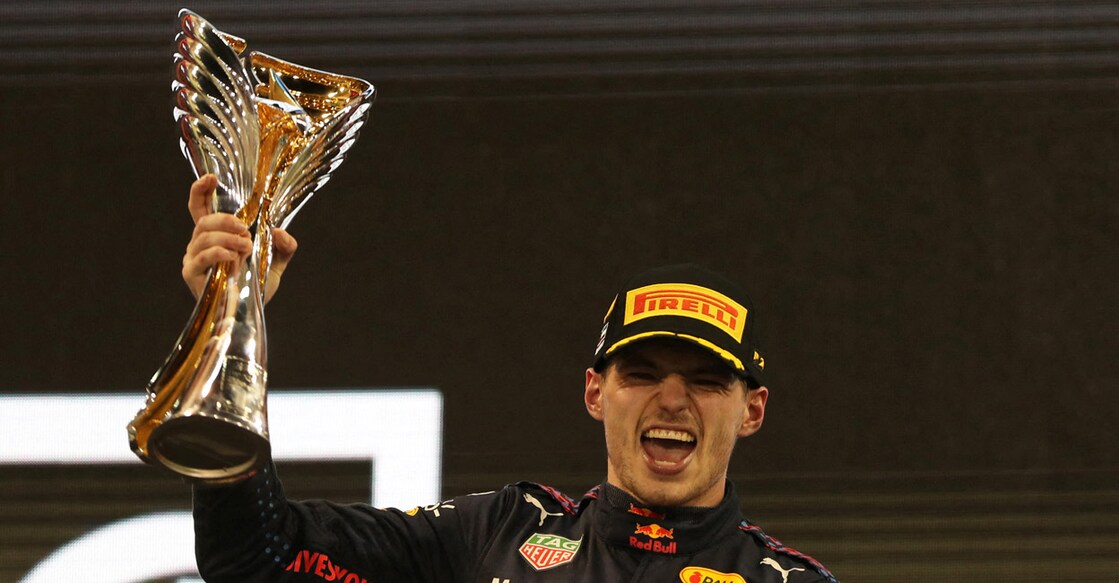 Max Verstappen celebrates winning the Abu Dhabi GP with it the world title. Photo: Reuters/Kamran Jebreili