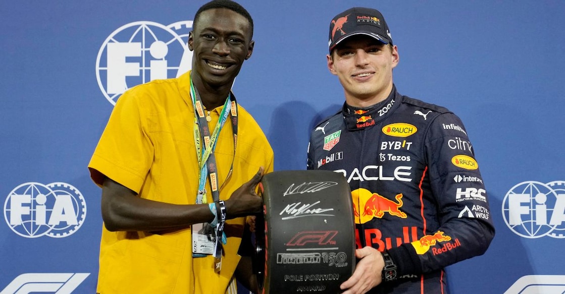 Red Bull's Max Verstappen celebrates after qualifying in pole position with Social media personality Khaby Lame. Photo: Reuters/Kamran Jebreili