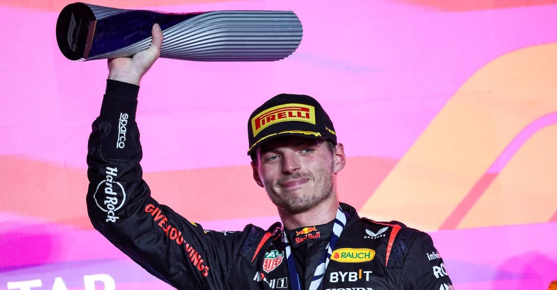 ax Verstappen celebrates on the podium following the Qatari Formula One Grand Prix at Lusail International Circuit . Photo: Giuseppe CACACE / AFP
