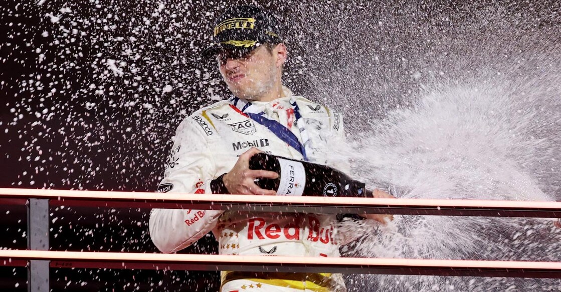  Red Bull's Max Verstappen celebrates on the podium. Photo: Reuters/Mike Blake