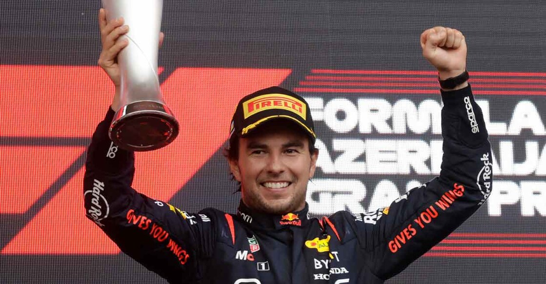 Red Bull's Sergio Perez celebrates on the podium. Photo: Reuters/Leonhard Foeger