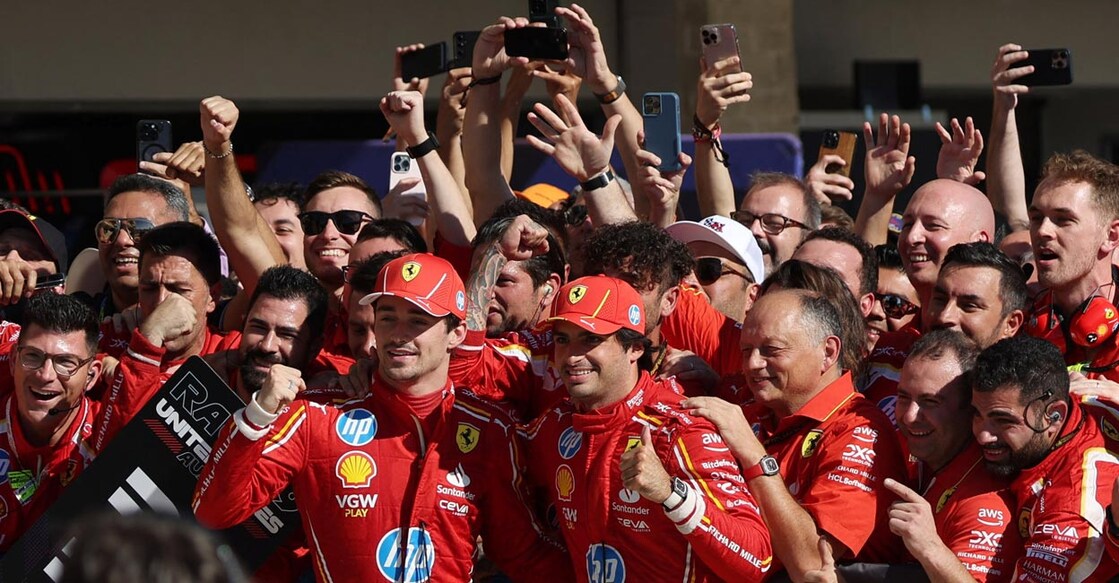 Ferrari's Charles Leclerc celebrates with second placed Carlos Sainz Jr after the race. Photo: Reuters/Kaylee Greenlee Beal