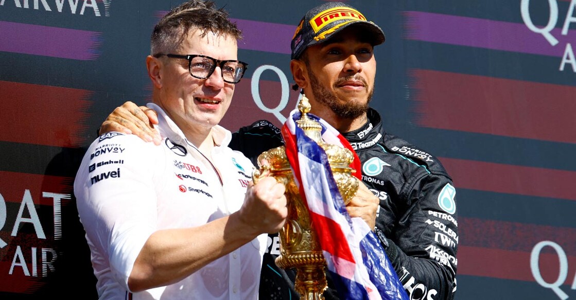 Lewis Hamilton, right, celebrates with Mercedes race engineer Peter Bonnington after winning the British GP in July. File photo: Reuters/Peter Cziborra
