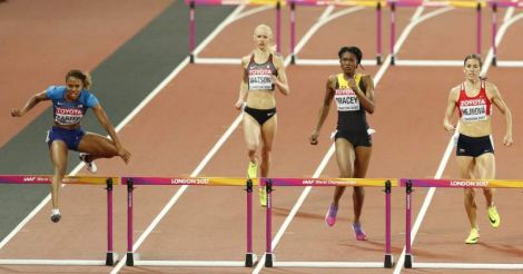ATHLETICS-WORLD-W400H, Carter earns shock 400m hurdles win from outside lane
