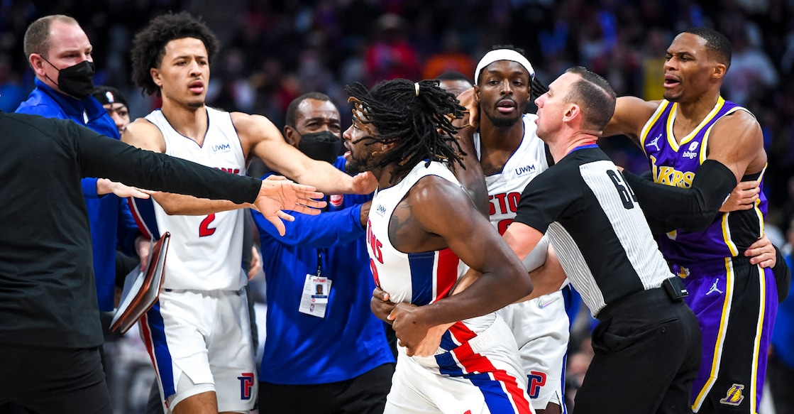 Isaiah Stewart is restrained as he goes after LeBron James. Photo: AFP/Nic Antaya