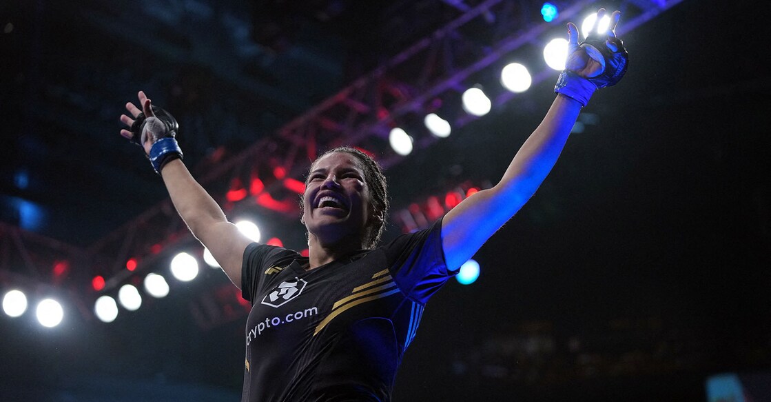 Julianna Pena celebrates her victory over Amanda Nunes. Photo: USA TODAY Sports/Stephen R. Sylvanie/Reuters