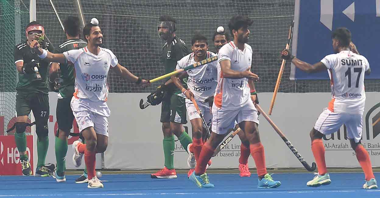 FHOCKEY-IND-PAK India's players celebrate after scoring a goal against Pakistan at the Asian Championship Trophy tournament in Dhaka on Wednesday. Photo: AFP