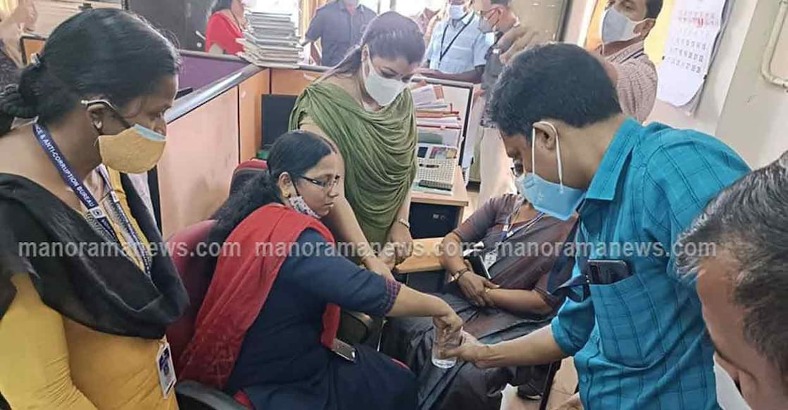 Vigilance officials arrested university assistant CJ Elsy from inside the university campus in Kottayam on Saturday. 