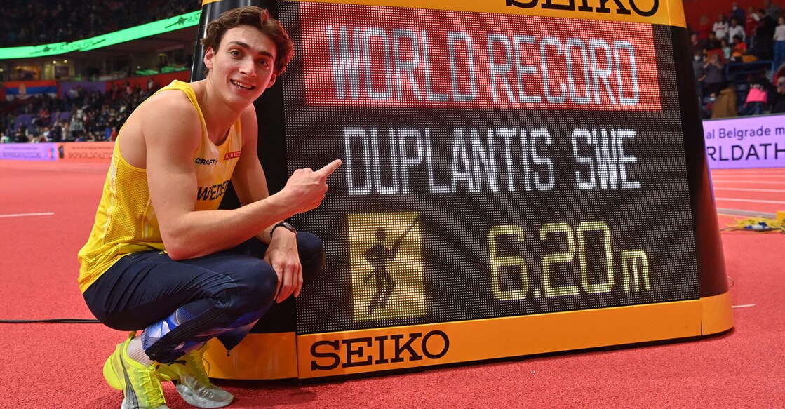 Sweden's Armand Duplantis celebrates after breaking the world indoor record in men's pole vault. Photo: AFP/ Andrej Sakovic