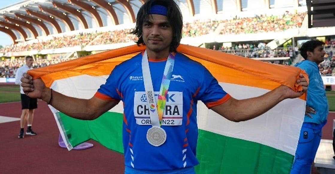Neeraj Chopra proudly displays his silver medal. Photo: IANS