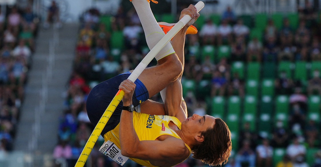 Sweden's Armand Duplantis in action as he clears 6.21m to set a new world record. Photo: Reuters/Aleksandra Szmigiel