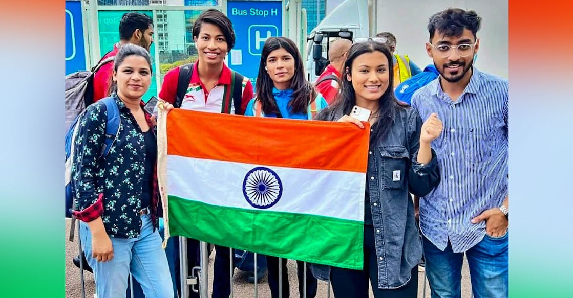 Commonwealth Games Boxers Lovlina Borgohain and Nikhat Zareen with fans upon their arrival for the Commonwealth Games 2022, in Birmingham, England. Photo: PTI