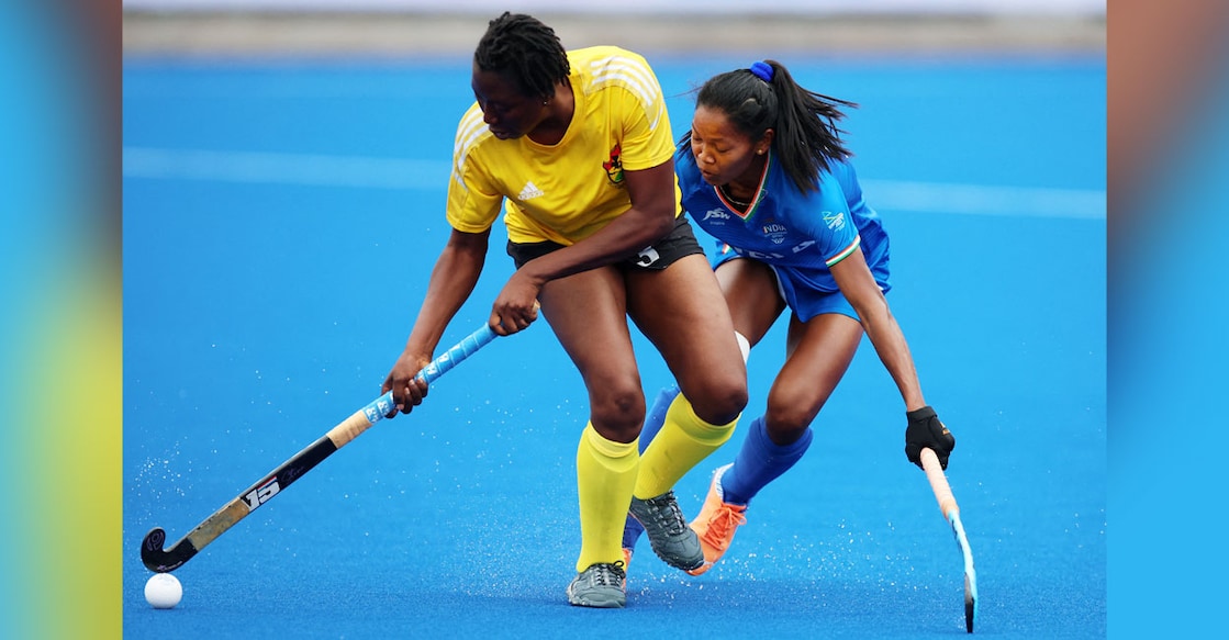 Action between India (blue) and Ghana in womne's hockey of Commonwealth Games 2022 at University of Birmingham Hockey and Squash Centre on Friday. Photo: Reuters/ Phil Noble