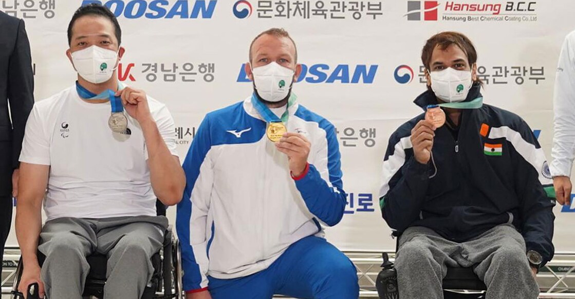 Sidhartha Babu (right) poses on the podium in the Para Shooting World Cup in Changwon, Korea. Photo: Facebook/ @shootingparasport