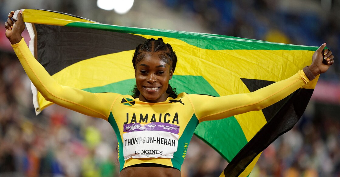 Jamaica's Elaine Thompson-Herah celebrates after winning the gold. Photo: Reuters/John Sibley