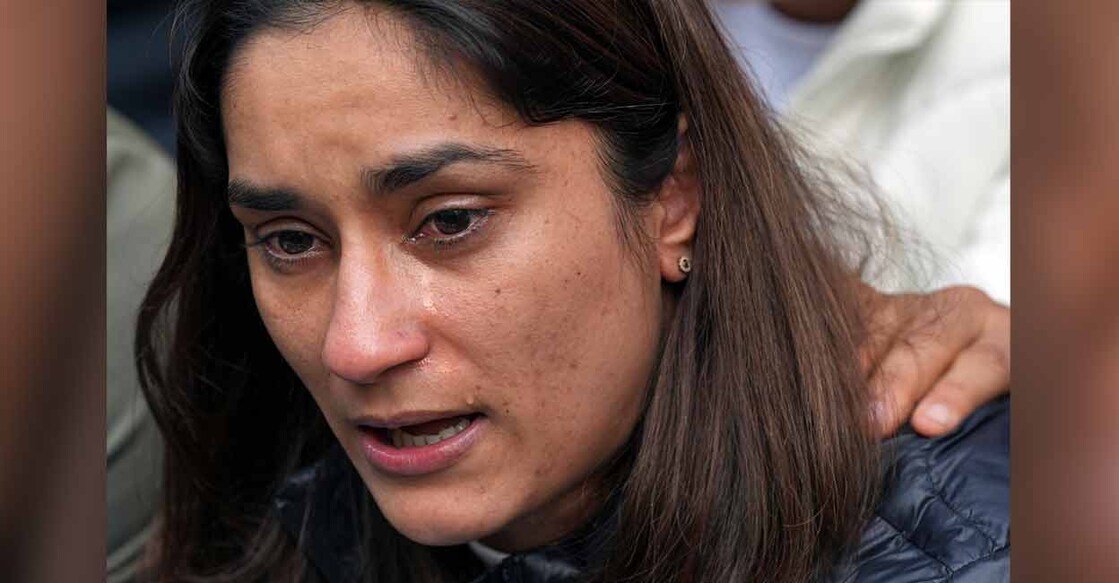 Indian wrestler Vinesh Phogat reacts during a press conference in New Delhi on Wednesday. Photo: PTI
