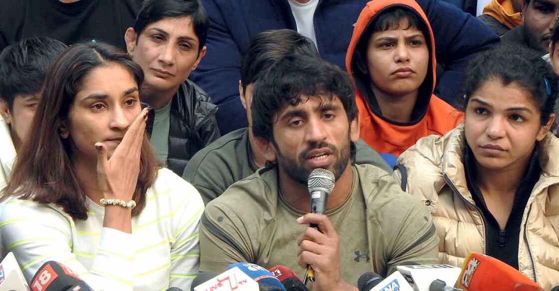From left: Vinesh Phogat, Bajrang Punia and Sakshi Malik during the protest in New Delhi. Photo: IANS