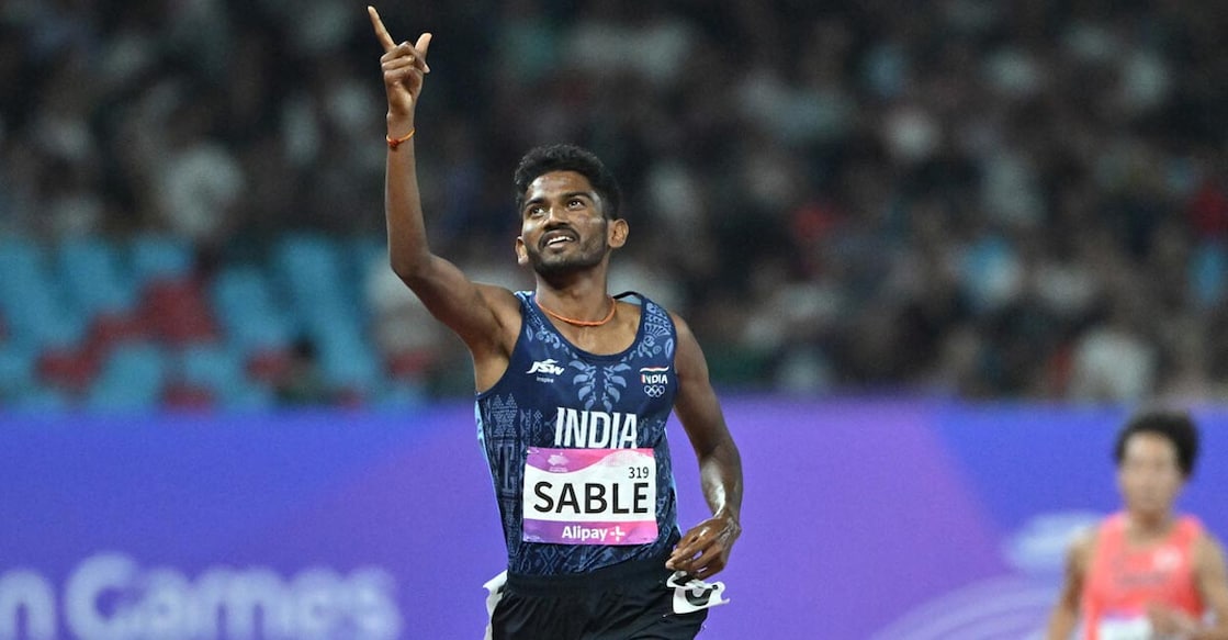 It was a race to remember for Avinash Sable. Photo: AFP/Hector Retamal 