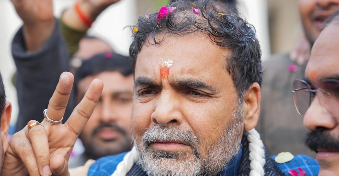 Sanjay Singh flashes the victory sign after the result. File photo: PTI/Manvender Vashist Lav