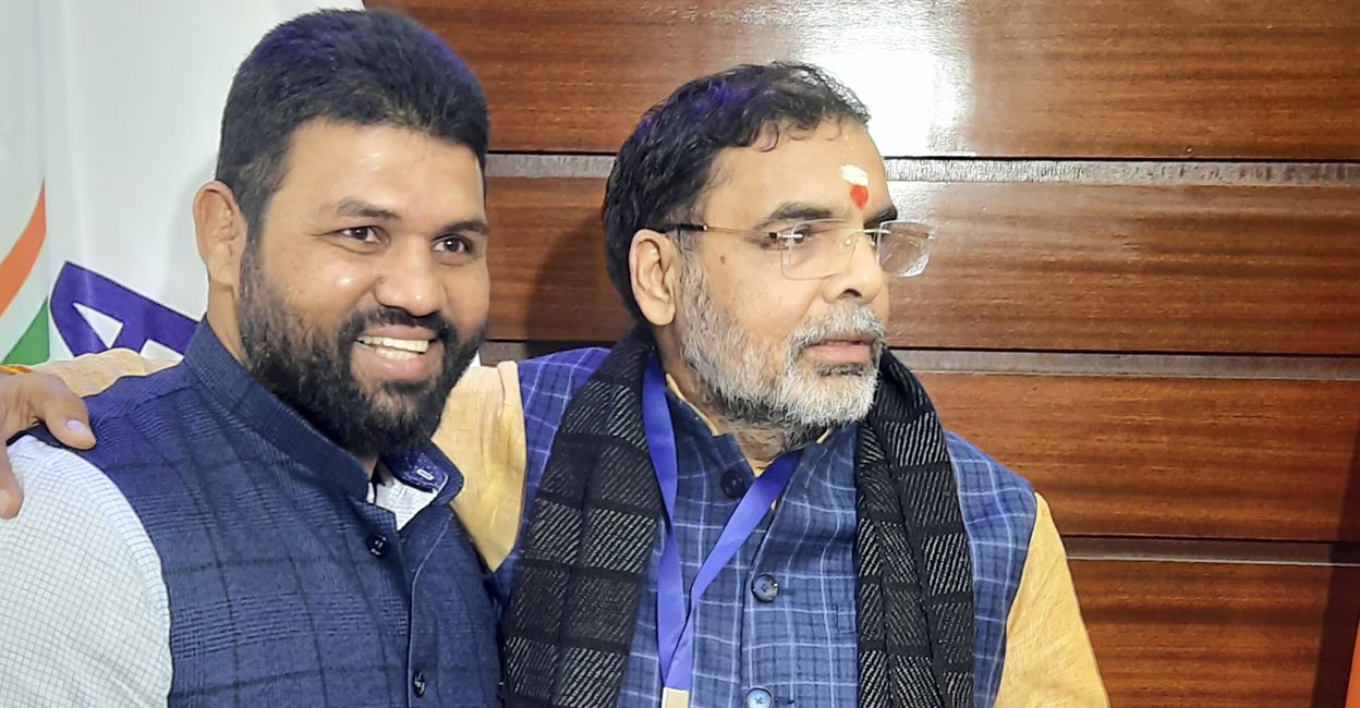 Wrestling Federation of India chief Sanjay Singh (right) in New Delhi on Thursday. Photo: PTI /Ajay K Masand