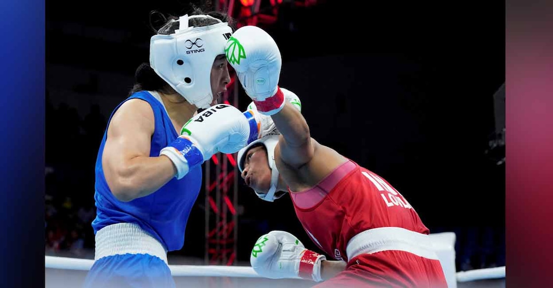 India's Lovlina Borgohain in action against Li Qian of China in the 75kg category semifinal bout at the 2023 IBA Women's Boxing World Championships in New Delhi on Thursday. Photo: PTI/Gurinder Osan
