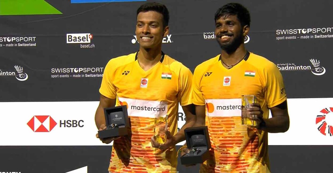 Chirag Shetty and Satwiksairaj Rankireddy celebrate on the podium. Photo: Twitter@airnewsalerts
