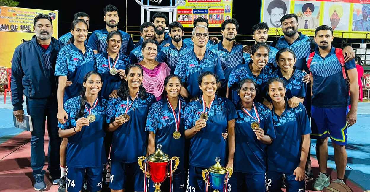 KSEB women pose with their medals and trophies. Photo: Special arrangement
