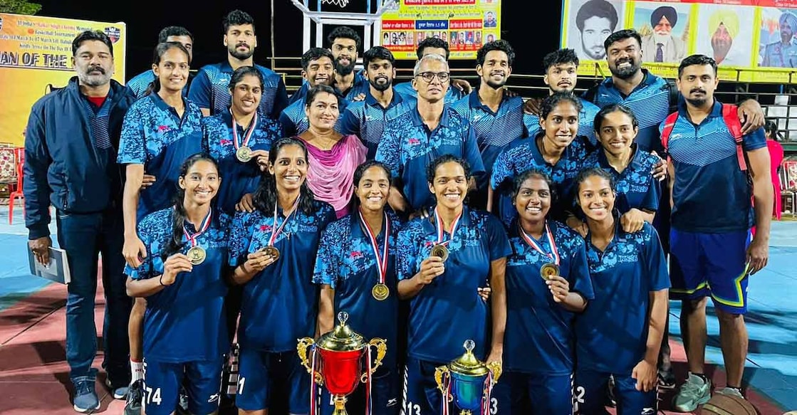 KSEB women pose with their medals and trophies. Photo: Special arrangement